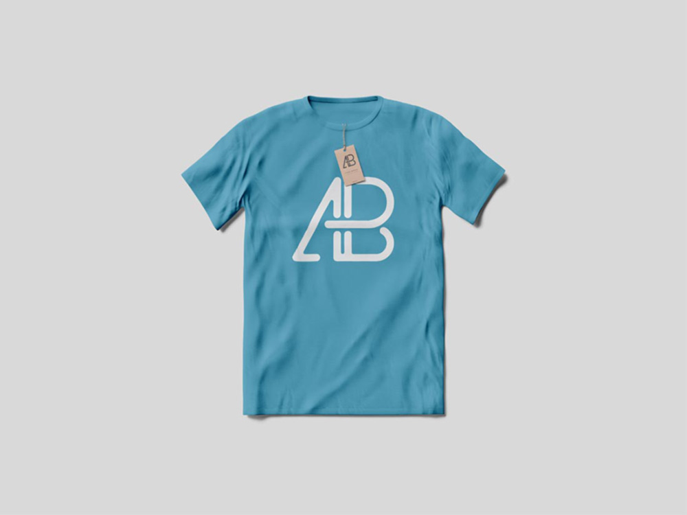 Blue T-Shirt with Tag on light grey Background