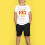 Young Kid Standing in-front of yellow wall